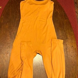 Orange two piece with jumpsuit and long cardigan size medium. New